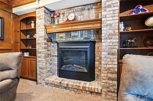 1101 Fox Chase Ct, Centerville, OH 45459 - living room featuring carpet, a brick fireplace, and built in features