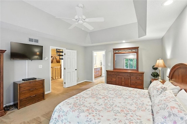 1101 Fox Chase Ct, Centerville, OH 45459 - bedroom with light carpet, recessed lighting, ensuite bathroom, a raised ceiling, and a ceiling fan