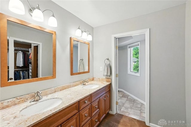 1101 Fox Chase Ct, Centerville, OH 45459 - full bath featuring double vanity and a walk in closet
