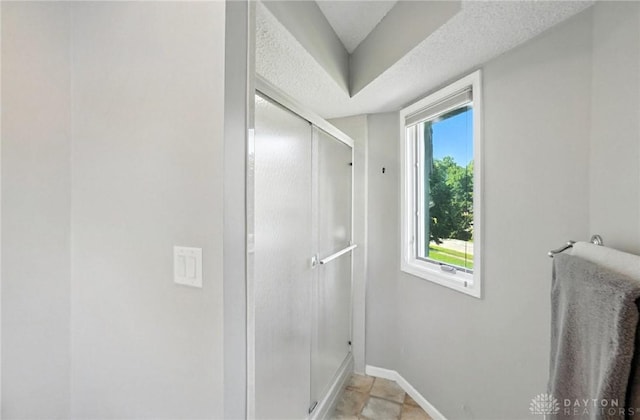 1101 Fox Chase Ct, Centerville, OH 45459 - bathroom with a stall shower and baseboards
