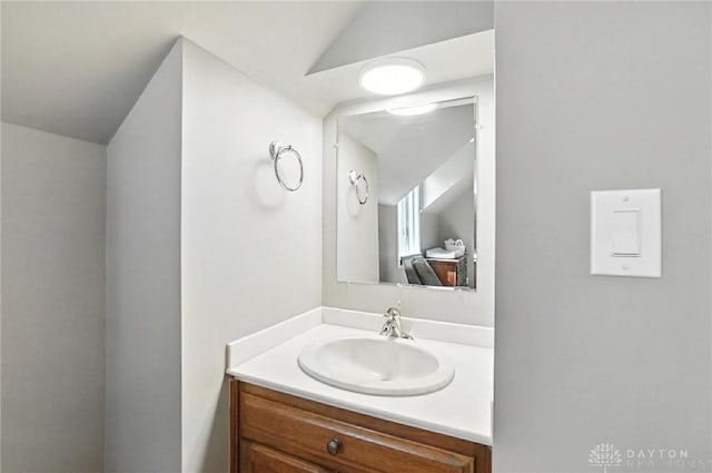 1101 Fox Chase Ct, Centerville, OH 45459 - bathroom featuring vanity and lofted ceiling