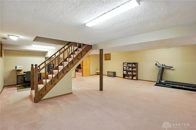 1101 Fox Chase Ct, Centerville, OH 45459 - finished basement with carpet flooring, stairway, and a textured ceiling