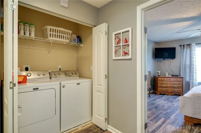 9270 Great Lakes Cir Unit 9270, Washington Twp, OH 45458 - laundry area with washer and dryer and dark wood-style flooring