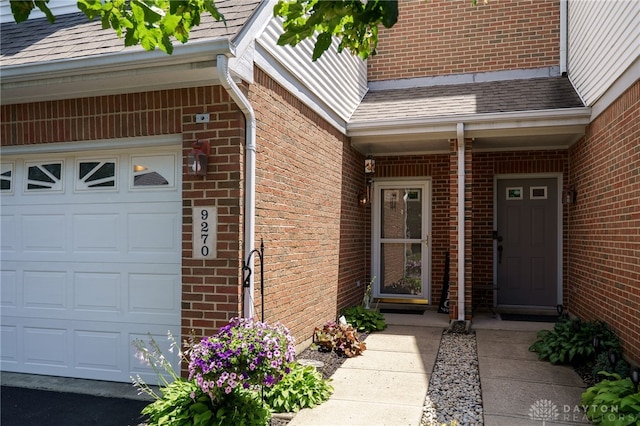 9270 Great Lakes Cir Unit 9270, Washington Twp, OH 45458 - entrance to property with brick siding and a shingled roof