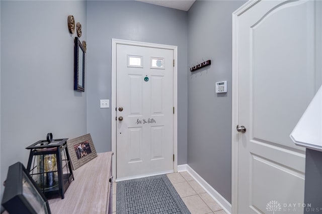 9270 Great Lakes Cir Unit 9270, Washington Twp, OH 45458 - foyer featuring light tile patterned floors and baseboards