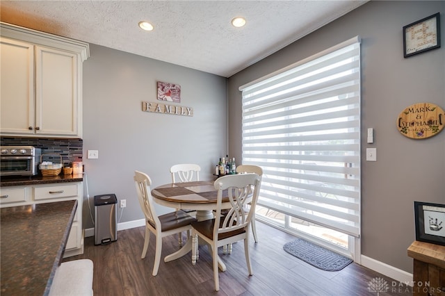 9270 Great Lakes Cir Unit 9270, Washington Twp, OH 45458 - dining area with a textured ceiling, dark wood-style floors, and recessed lighting