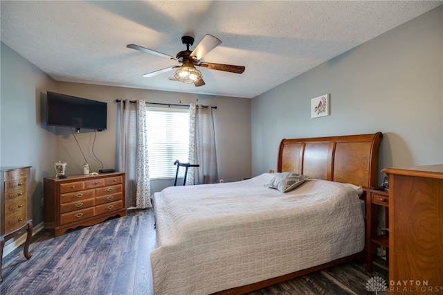 9270 Great Lakes Cir Unit 9270, Washington Twp, OH 45458 - bedroom with dark wood finished floors, a textured ceiling, and a ceiling fan