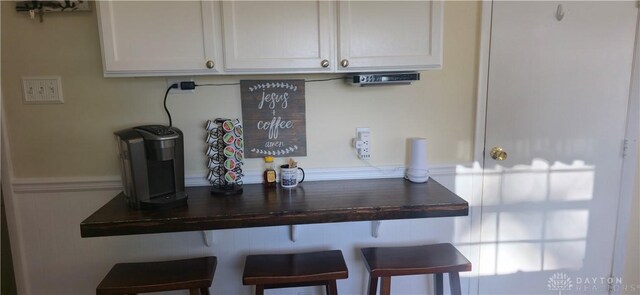 8320 N State Route 589, Fletcher, OH 45326 - kitchen featuring dark countertops and white cabinetry