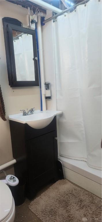 8320 N State Route 589, Fletcher, OH 45326 - full bathroom with vanity and a shower with curtain
