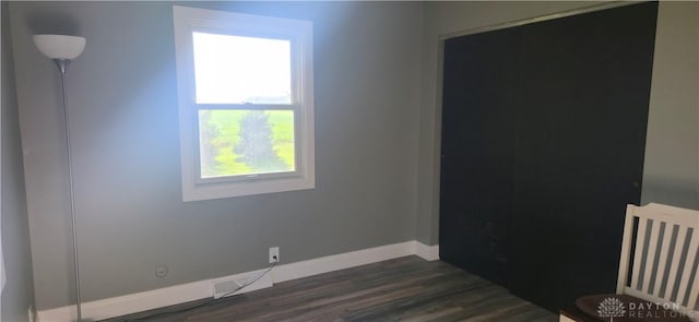 8320 N State Route 589, Fletcher, OH 45326 - spare room featuring dark wood finished floors and baseboards