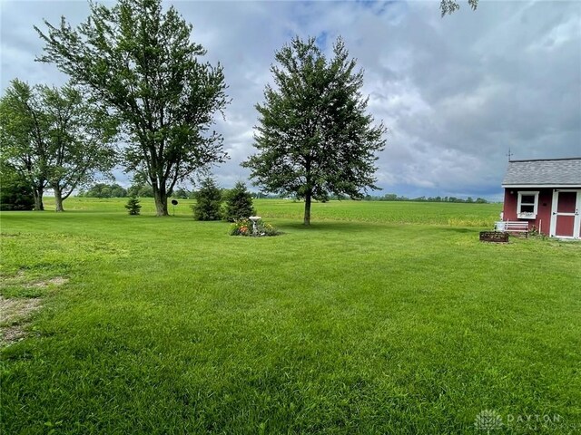 8320 N State Route 589, Fletcher, OH 45326 - view of green lawn with a storage unit