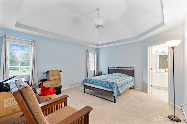 2396 Vienna Pkwy, Dayton, OH 45459 - bedroom featuring a raised ceiling, carpet flooring, a ceiling fan, and connected bathroom