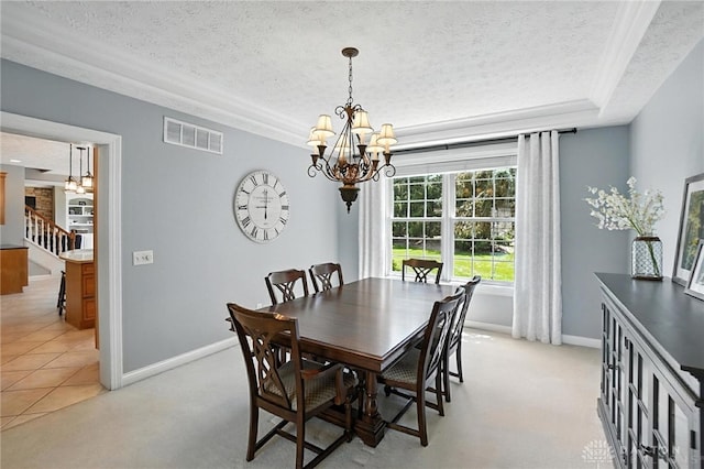 10598 Falls Creek Ln, Washington Twp, OH 45458 - dining area featuring a textured ceiling, a chandelier, light colored carpet, and stairs