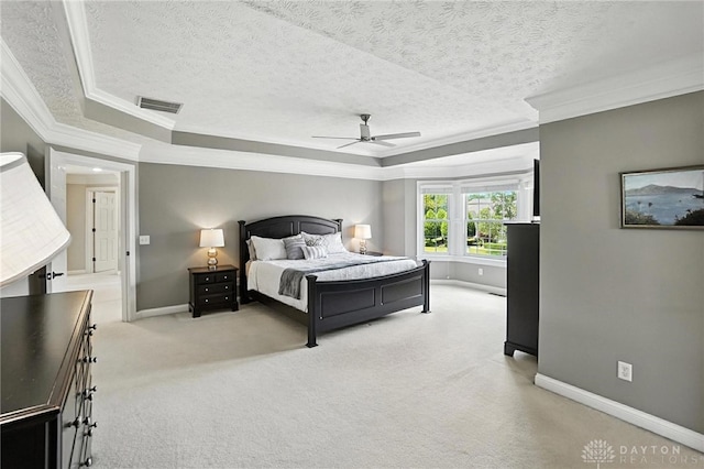 10598 Falls Creek Ln, Washington Twp, OH 45458 - bedroom with a raised ceiling, crown molding, a textured ceiling, light colored carpet, and a ceiling fan