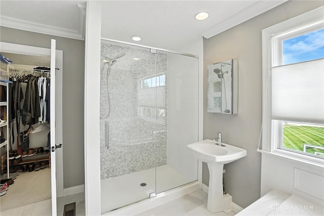 10598 Falls Creek Ln, Washington Twp, OH 45458 - full bathroom with a shower stall, a spacious closet, ornamental molding, and recessed lighting