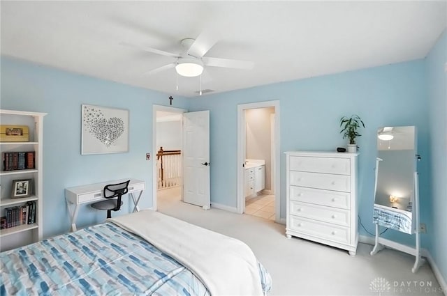 10598 Falls Creek Ln, Washington Twp, OH 45458 - bedroom featuring light carpet, ensuite bath, and ceiling fan