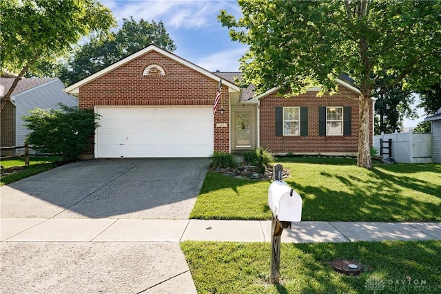 162 Choctaw Cir, Franklin, OH 45005 - view of front of house featuring concrete driveway, an attached garage, and brick siding