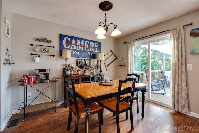 162 Choctaw Cir, Franklin, OH 45005 - dining area with a chandelier and wood finished floors