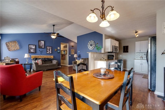 162 Choctaw Cir, Franklin, OH 45005 - dining space featuring dark wood-type flooring, a chandelier, ceiling fan, and lofted ceiling