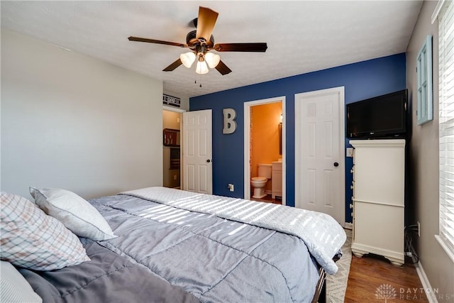 162 Choctaw Cir, Franklin, OH 45005 - bedroom with wood finished floors, multiple windows, ensuite bathroom, and ceiling fan