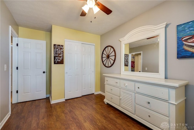 162 Choctaw Cir, Franklin, OH 45005 - bedroom with dark wood-type flooring, a closet, and a ceiling fan