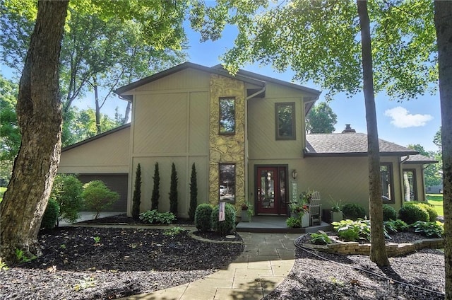 1778 Kensington Dr, Bellbrook, OH 45305 - mid-century modern home featuring roof with shingles and a garage
