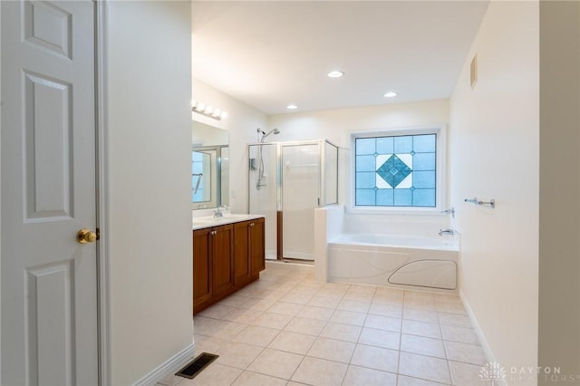 2540 Early Spring Ct, Dayton, OH 45459 - bathroom featuring a shower stall, vanity, a bath, tile patterned flooring, and recessed lighting