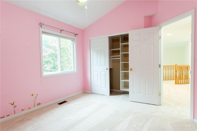 2540 Early Spring Ct, Dayton, OH 45459 - unfurnished bedroom with carpet floors, vaulted ceiling, and a closet