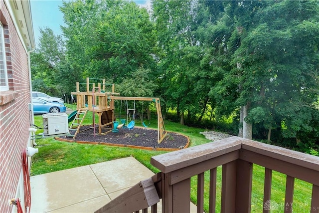 2540 Early Spring Ct, Dayton, OH 45459 - view of green lawn with a playground and view of scattered trees