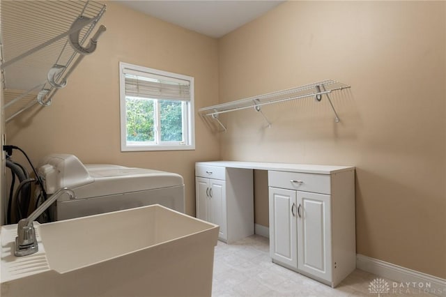 2540 Early Spring Ct, Dayton, OH 45459 - laundry room featuring cabinet space and washer and clothes dryer
