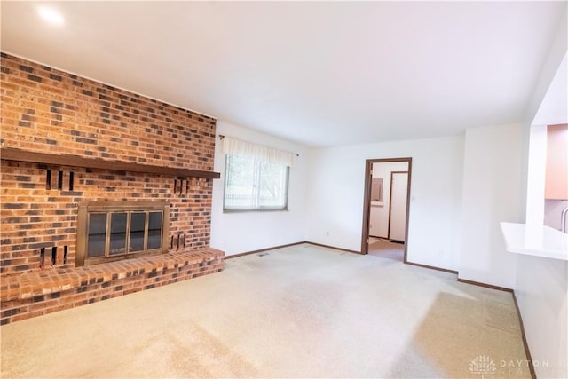 4425 E Entrada Dr, Beavercreek, OH 45431 - unfurnished living room featuring carpet flooring and a fireplace