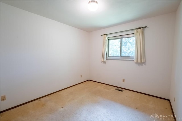 4425 E Entrada Dr, Beavercreek, OH 45431 - spare room with light carpet and baseboards
