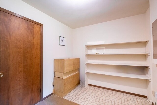 4425 E Entrada Dr, Beavercreek, OH 45431 - interior space with baseboards and brick patterned flooring