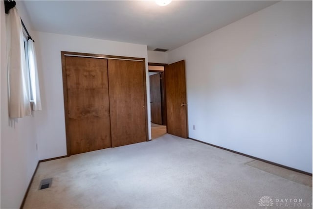 4425 E Entrada Dr, Beavercreek, OH 45431 - unfurnished bedroom with carpet flooring and a closet