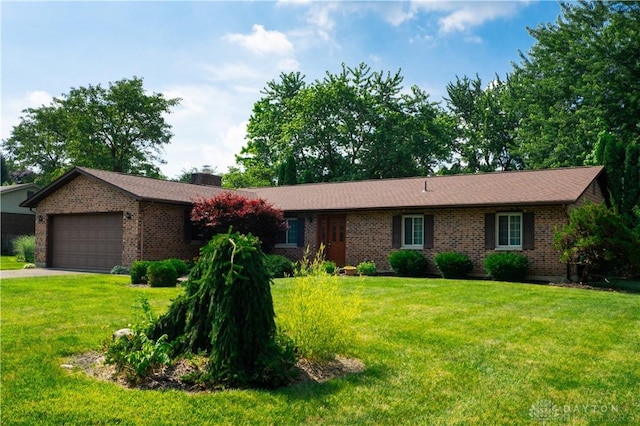 4425 E Entrada Dr, Beavercreek, OH 45431 - ranch-style home featuring brick siding, a front yard, an attached garage, driveway, and a chimney