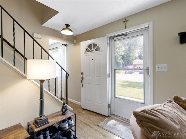 6118 Carnation Rd, Dayton, OH 45449 - entrance foyer featuring light wood-style floors and stairs