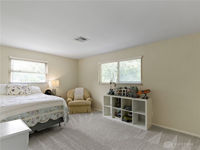 6118 Carnation Rd, Dayton, OH 45449 - bedroom featuring multiple windows and carpet floors