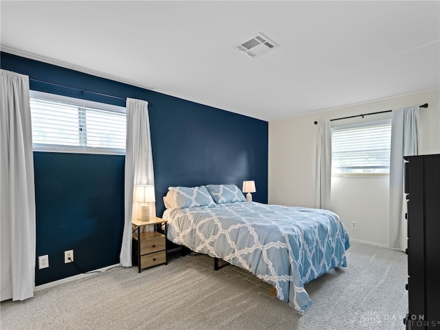 6118 Carnation Rd, Dayton, OH 45449 - bedroom featuring multiple windows and carpet flooring