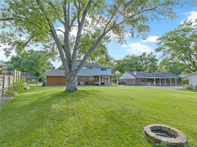 6118 Carnation Rd, Dayton, OH 45449 - view of yard with an outdoor fire pit