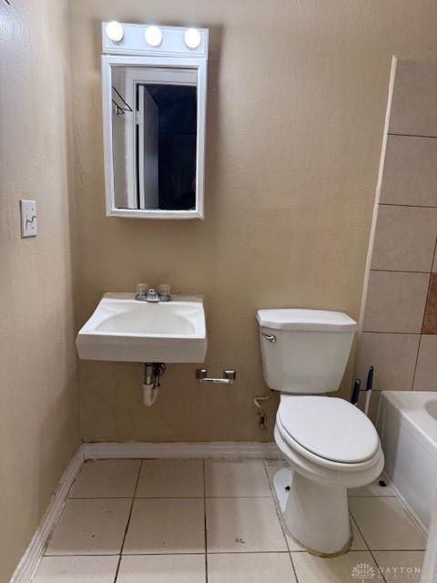 4129 E 3rd St Unit 4127, Dayton, OH 45403 - full bath featuring toilet and tile patterned flooring