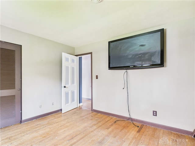 2120 Wyoming St, Dayton, OH 45410 - unfurnished bedroom with light wood finished floors and a closet