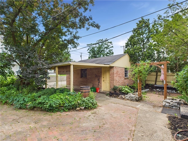 2120 Wyoming St, Dayton, OH 45410 - view of front of home featuring brick siding and a patio area