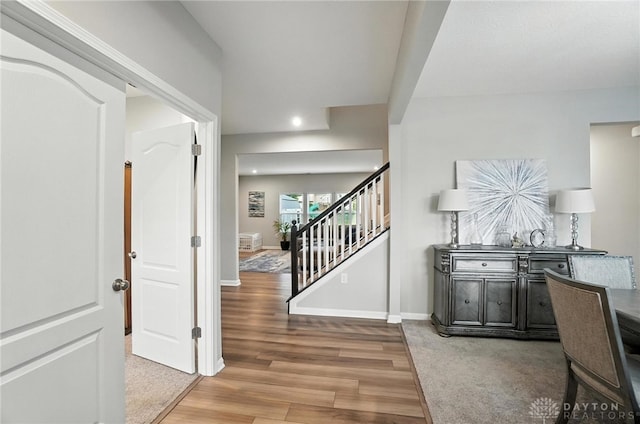166 Brooke Parke Ave, Brookville, OH 45309 - hall featuring wood finished floors, stairway, and recessed lighting