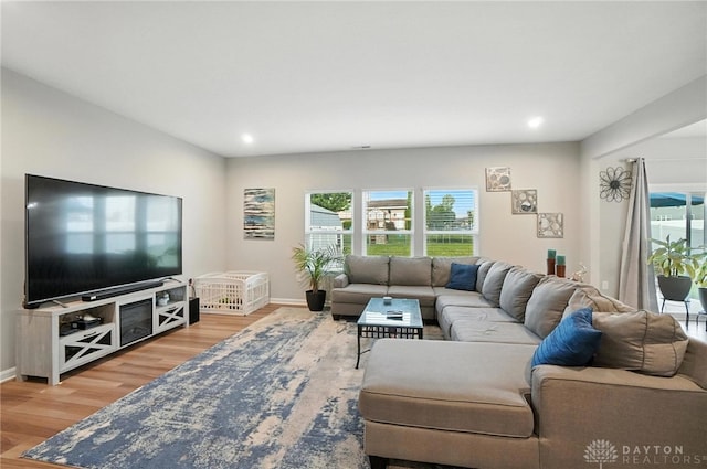166 Brooke Parke Ave, Brookville, OH 45309 - living room featuring light wood finished floors, plenty of natural light, and recessed lighting