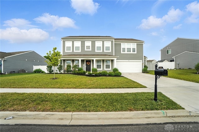 166 Brooke Parke Ave, Brookville, OH 45309 - traditional home featuring concrete driveway and an attached garage