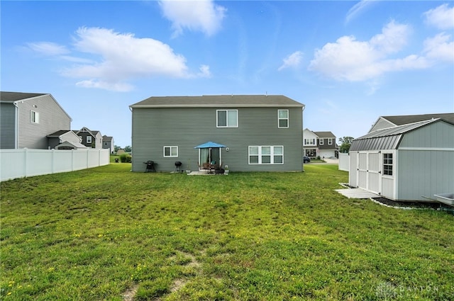 166 Brooke Parke Ave, Brookville, OH 45309 - rear view of house featuring a storage unit