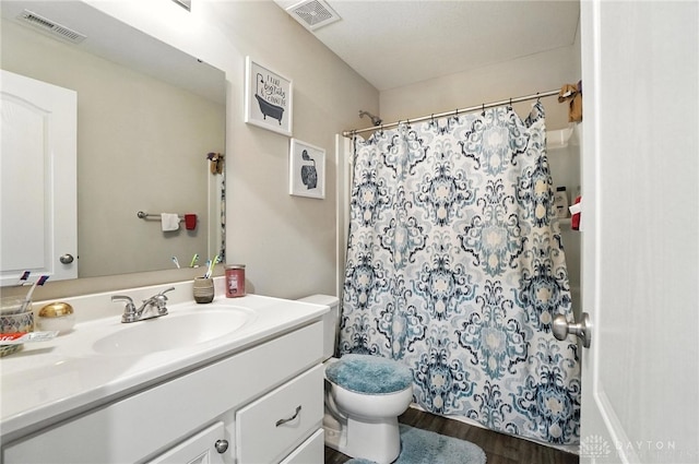 166 Brooke Parke Ave, Brookville, OH 45309 - full bath with vanity, wood finished floors, and a shower with shower curtain