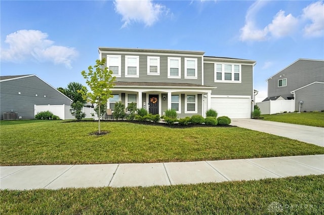 166 Brooke Parke Ave, Brookville, OH 45309 - traditional home featuring driveway, a garage, and covered porch