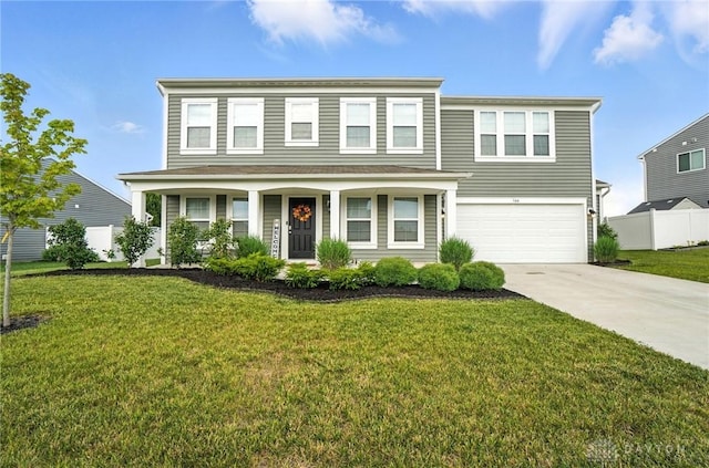 166 Brooke Parke Ave, Brookville, OH 45309 - traditional-style home featuring driveway, an attached garage, and covered porch