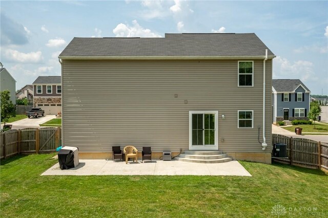 1009 Glen Kegley Dr, Xenia, OH 45385 - rear view of property with a patio area and a fenced backyard